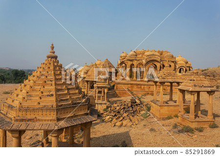 Golden Cenotaphs or Chhatris of Bada Bagh or Barabagh carved out of sandstone blocks, Jaisalmer, Rajasthan, India. 85291869