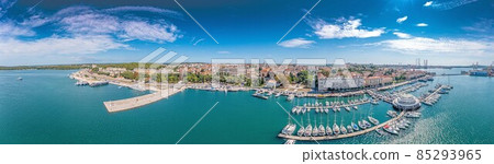 Drone panorama of the Croatian coastal city of Pula taken during the day above the harbor Drone panorama of the Croatian coastal city of Pula taken during the day above the harbor 85293965