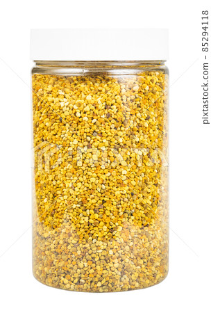 closed glass jar with natural bee pollen isolated 85294118