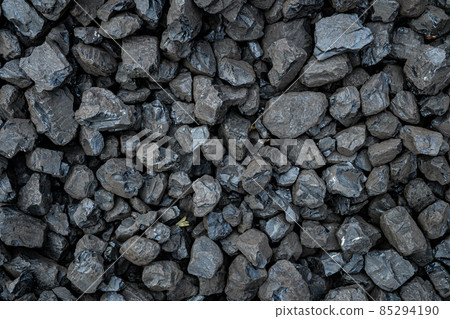 A heap of brown natural coal background A heap of brown natural coal background 85294190
