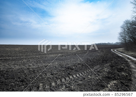 Black earth plowed field spring time Black earth plowed field spring time 85296567