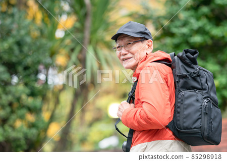 Senior male hiking hobby mountain walking 85298918