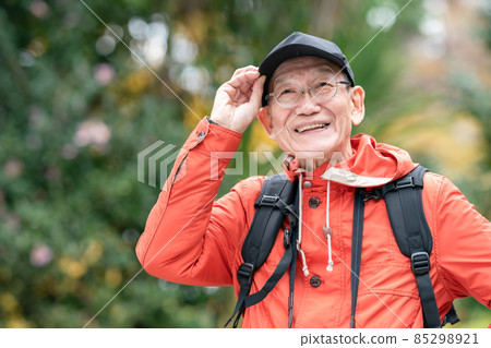 Senior male hiking hobby mountain walking 85298921