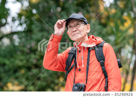 Senior male hiking hobby mountain walking 85298928