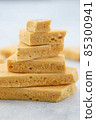 Dessert caramel honeycomb toffee on a white background. 85300941