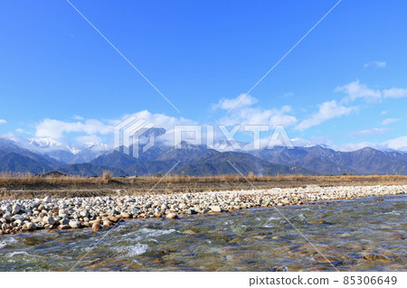 Winter Azumino clear stream and Northern Alps Winter Azumino clear stream and Northern Alps 85306649