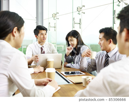team of asian business men and women meeting in modern office team of asian business men and women meeting in modern office 85306666