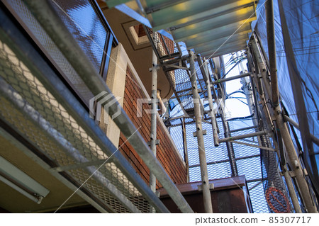 Painting the exterior walls of an apartment Painting the exterior walls of an apartment 85307717