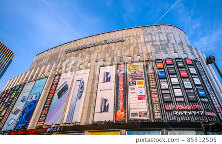 Tokyo cityscape of Japan Akihabara of Corona. Looking at mass retailers in the setting sun = December 16th 85312505