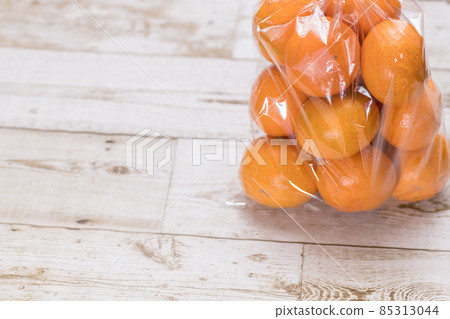 Mandarin oranges in a plastic bag 85313044