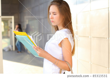 Business woman girl work business center look at documents Business woman girl work business center look at documents 85313531