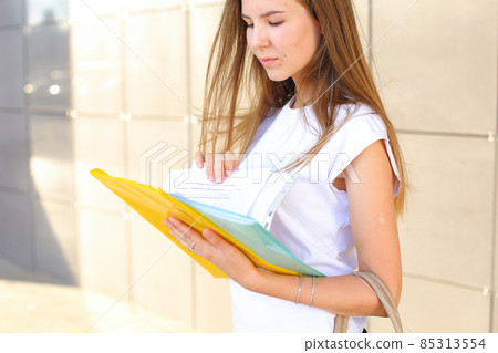 Business woman girl work business center look at documents Business woman girl work business center look at documents 85313554