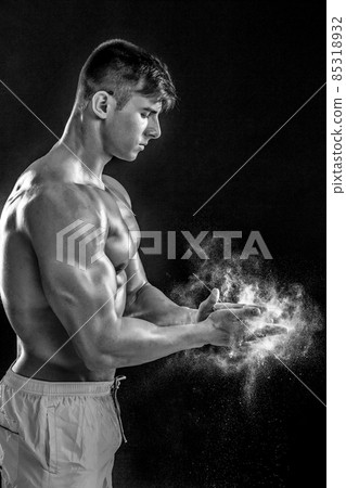 Preparing hands for lifting weights 85318932