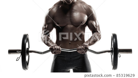 Young handsome man with naked torso and barbell Young handsome man with naked torso and barbell 85319629