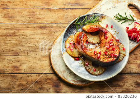Delicious grilled salmon with pineapple Delicious grilled salmon with pineapple 85320230