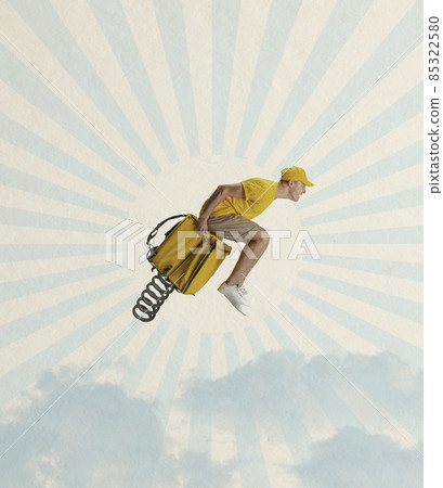 Modern design, contemporary art collage. Inspiration, idea, trendy urban magazine style. Young man, delivery man flying on yellow backpack. 85322580