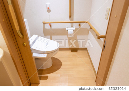 Toilet with handrail in elderly housing 85323014