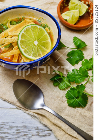 Mexican soup Sopa de Lima 85325124