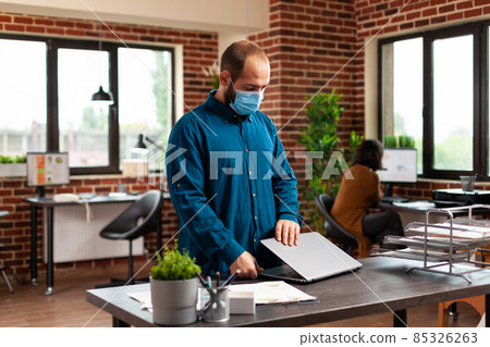 Executive manager with medical protection face mask to against covid19 Executive manager with medical protection face mask to against covid19 85326263