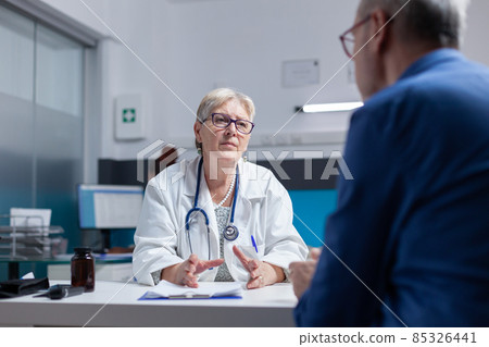 Doctor and patient meeting at consultation appointment to do healthcare checkup Doctor and patient meeting at consultation appointment to do healthcare checkup 85326441