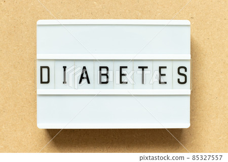 Lightbox with word diabetes on wood background Lightbox with word diabetes on wood background 85327557