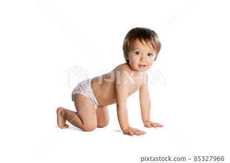 Portrait of little boy, baby, child in diaper isolated over white studio background. Childhood concept 85327966