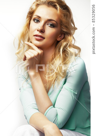 young pretty stylish blond girl posing emotional isolated on white background happy smiling cool smile, lifestyle people concept young pretty stylish blond girl posing emotional isolated on white background happy smiling cool smile, lifestyle people concept 85329056