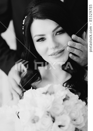 black and white portrait. the bride and the groom's hand. protection and support black and white portrait. the bride and the groom's hand. protection and support 85329785