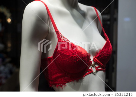 Closeup of red bra on mannequin in a fashion store showroom 85331215