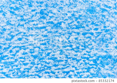 White snow abstract pattern on blue surface wall texture, winter, cold background White snow abstract pattern on blue surface wall texture, winter, cold background 85332174