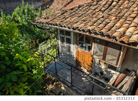 Old abandoned residential house in Veliko Tarnovo in Bulgaria. Old abandoned residential house in Veliko Tarnovo in Bulgaria. 85332313