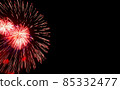 Festive red fireworks on background black sky, copy space. Concept of holiday 85332477