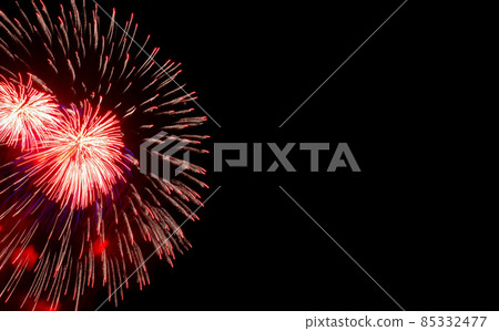 Festive red fireworks on background black sky, copy space. Concept of holiday 85332477