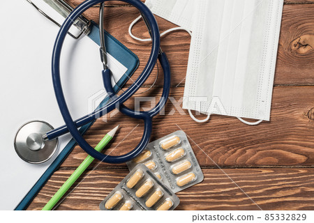 Desk of doctor with medicine things 85332829