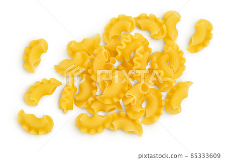 Pasta cornetti creste macaroni isolated on white background with clipping path and full depth of field. Top view. Flat lay Pasta cornetti creste macaroni isolated on white background with clipping path and full depth of field. Top view. Flat lay 85333609