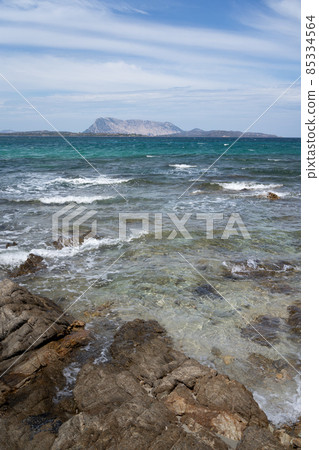beautiful view of the wavy sea on the east coast of Sardinia in Italy Europe beautiful view of the wavy sea on the east coast of Sardinia in Italy Europe 85334564