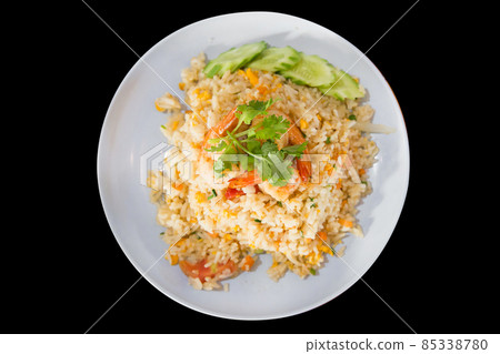 Die cut of Thai fried rice with prawns on black isolated. Die cut of Thai fried rice with prawns on black isolated. 85338780