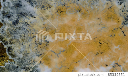 Marble texture of white and gold color. Luxurious abstract fluid art painting on the background of the technique of alcohol ink in black and gold colors. Marble texture of white and gold color. Luxurious abstract fluid art painting on the background of the technique of alcohol ink in black and gold colors. 85339351