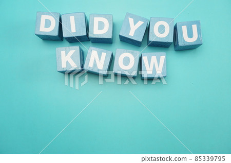 Did You Khow with blue building blocks top view flat lay on blue background 85339795