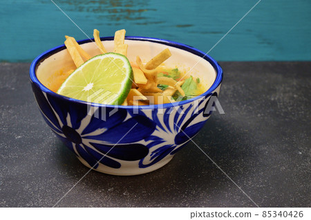 Mexican soup Sopa de Lima 85340426