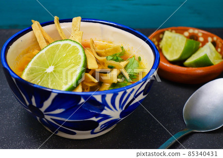 Mexican soup Sopa de Lima 85340431