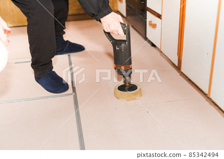 Polish the floor with an electric drill Polish the floor with an electric drill 85342494
