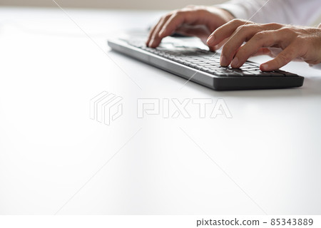 Programmer using computer keyboard Programmer using computer keyboard 85343889