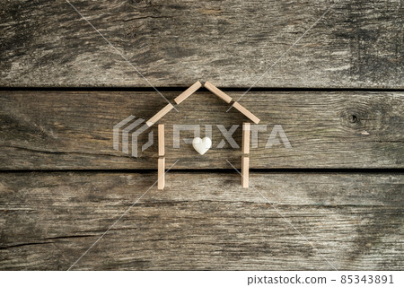 Real estate concept with a heart inside the frame of a house Real estate concept with a heart inside the frame of a house 85343891