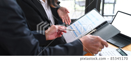 Cropped image of insurance broker is offering health insurance plans for client. 85345170