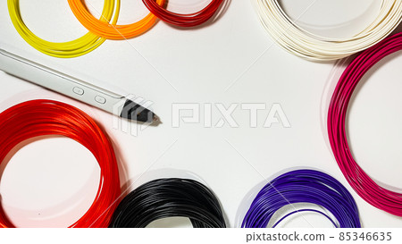 3D pen for drawing three-dimensional objects made of plastic and a lot of multi-colored plastic for creating beautiful objects 85346635
