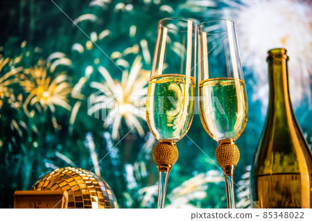 happy New Year champagne glasses and fireworks celebration background happy New Year champagne glasses and fireworks celebration background 85348022