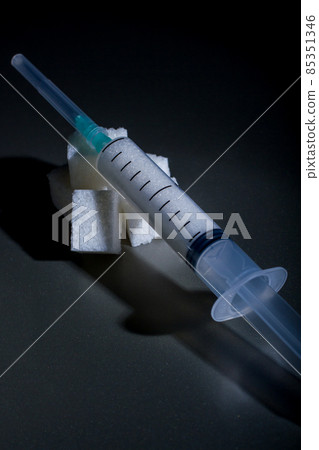 a syringe with sugar a syringe with sugar 85351346