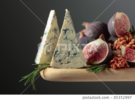 Blue cheese with figs, walnuts, and rosemary. Blue cheese with figs, walnuts, and rosemary. 85352997