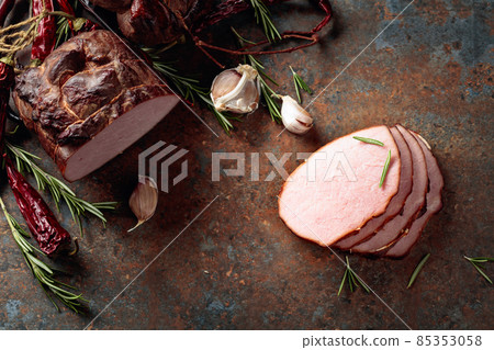 Smoked ham with rosemary, garlic, and red pepper. Smoked ham with rosemary, garlic, and red pepper. 85353058